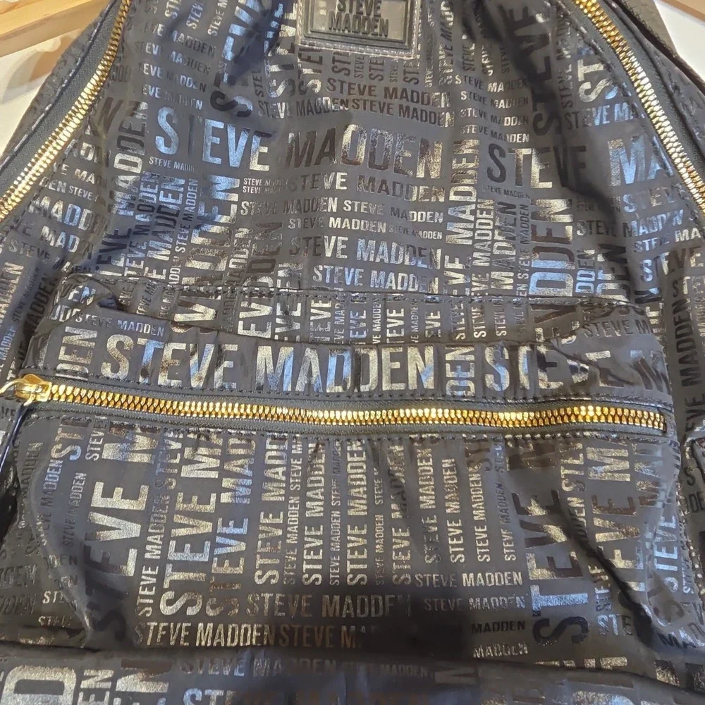 Steve Madden Black Logo Print Backpack Gold Tone Zippers Large Book Travel Bag